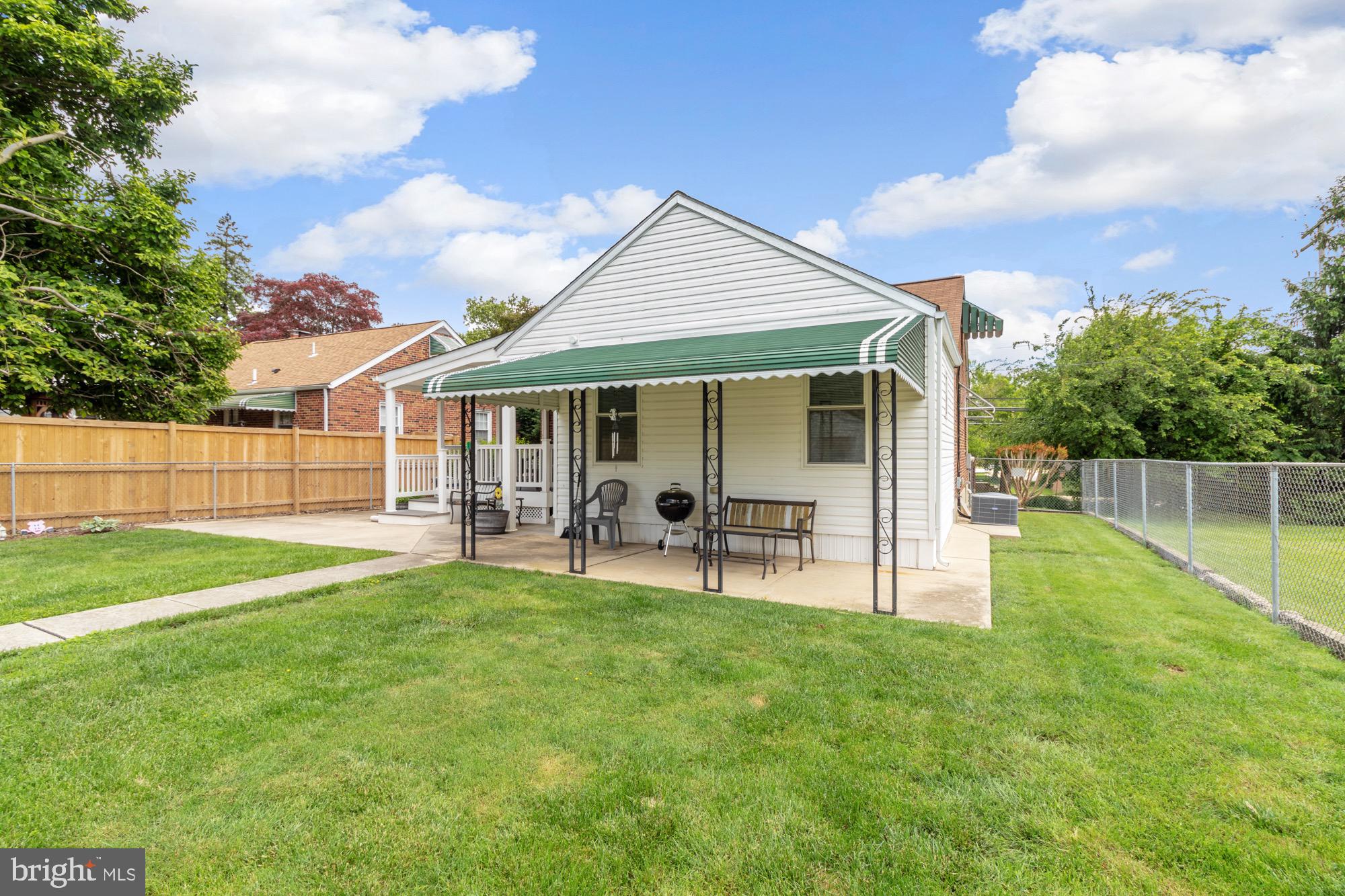 4305 Fullerton Avenue Baltimore, MD 21206 - Photo 30 of 36 a view of a house with a yard and sitting area
