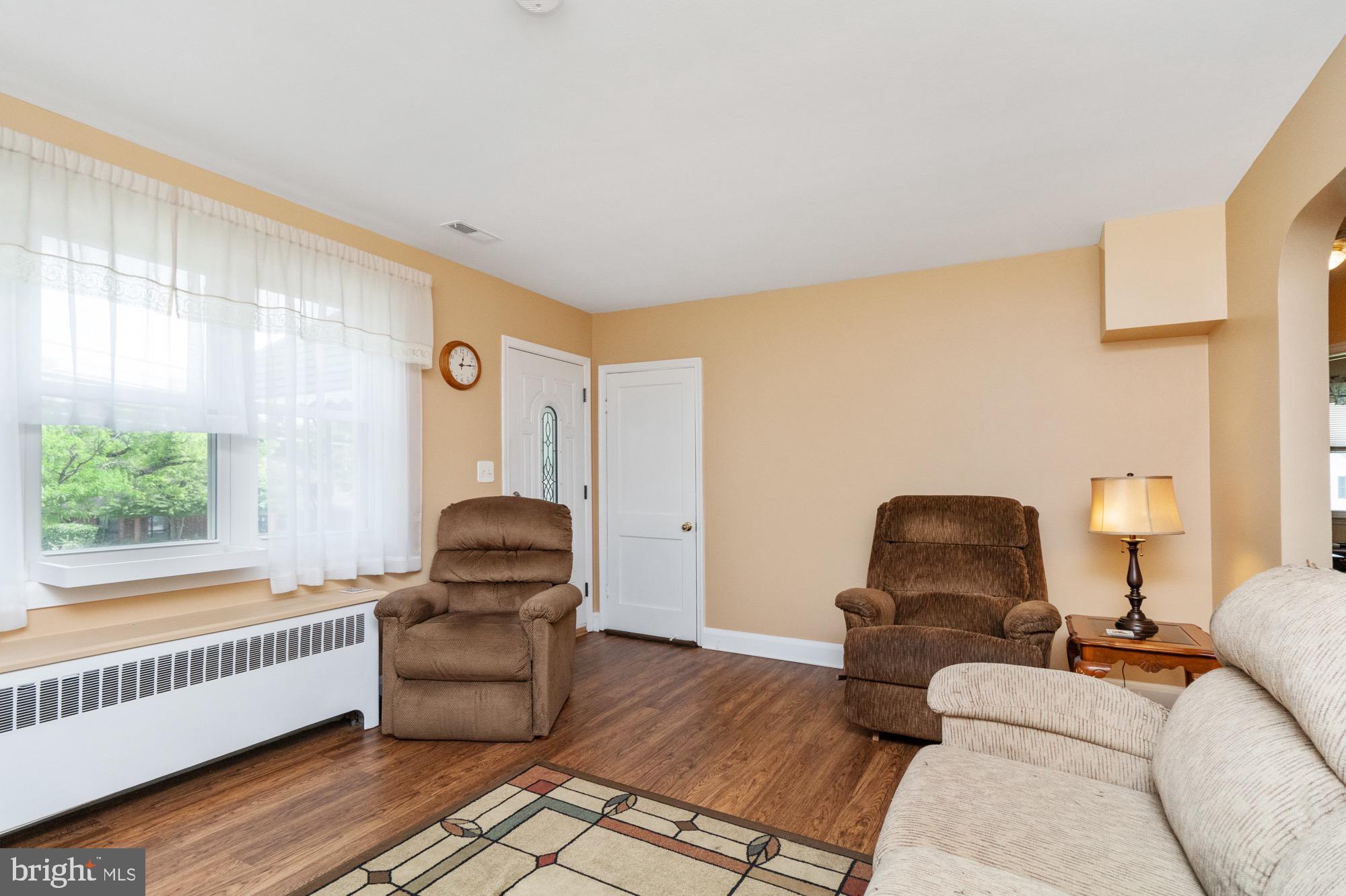 4305 Fullerton Avenue Baltimore, MD 21206 - Photo 7 of 36 a living room with furniture and a window