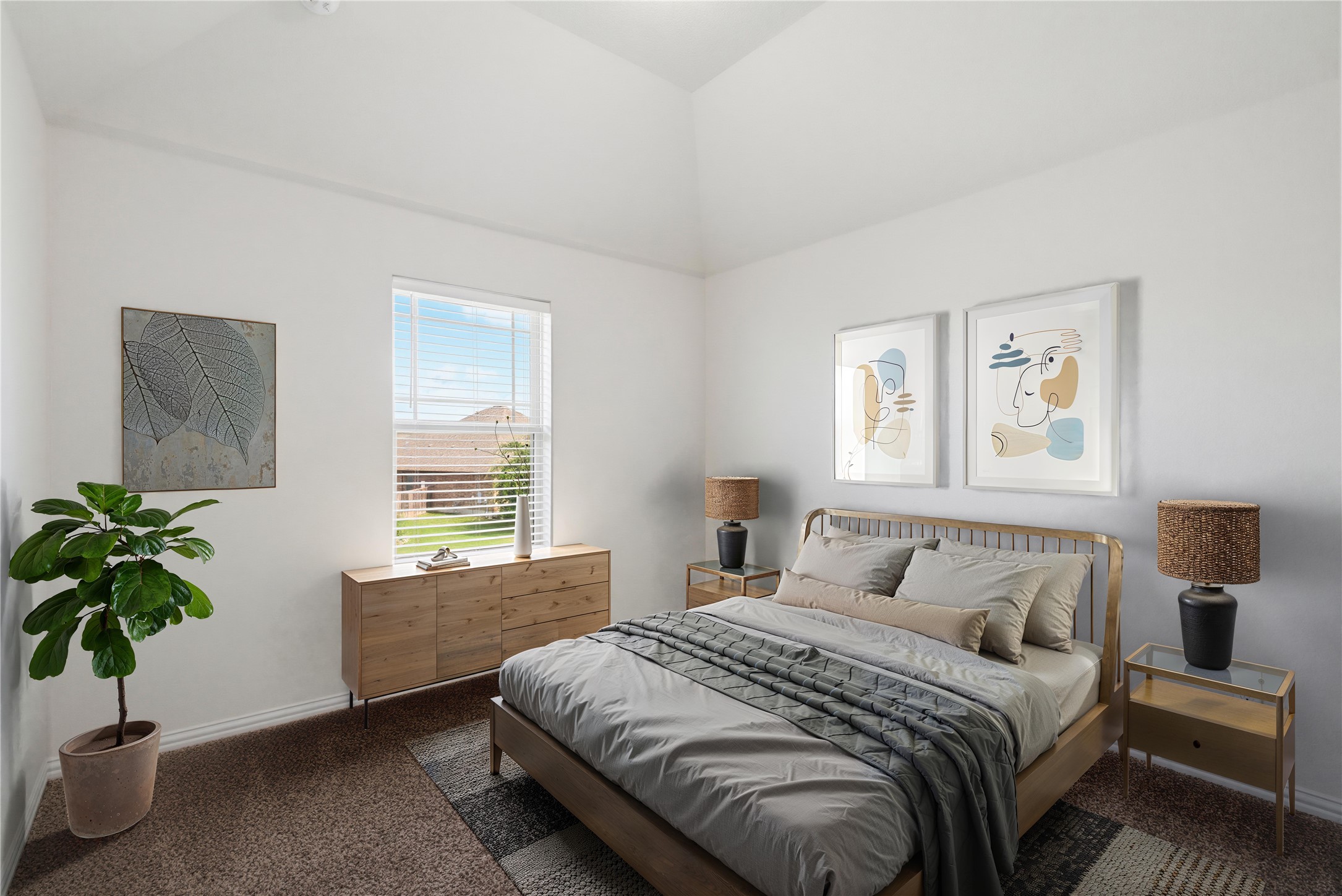 12613 Twisted Root Drive Manchaca, TX 78652 - Photo 22 of 33 An inviting bedroom with a soaring vaulted ceiling and a broad window.
