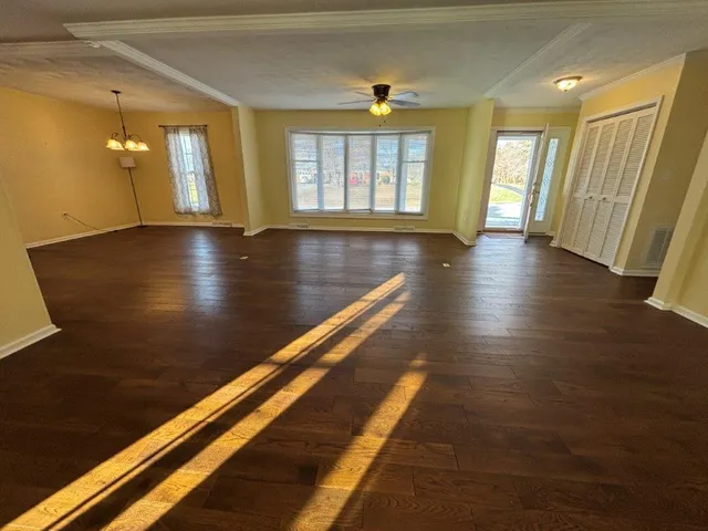 a kitchen with stainless steel appliances a refrigerator sink and cabinets