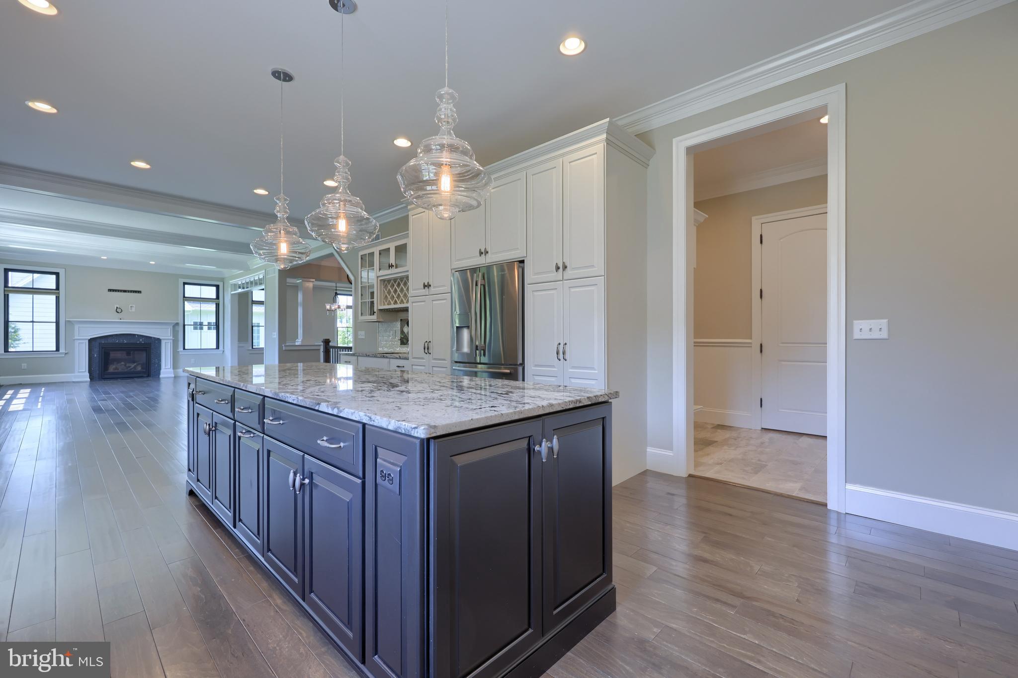 428 Southampton Drive Lititz, PA 17543 - Photo 28 of 60 a kitchen with granite countertop kitchen island wooden floor center island and stainless steel appliances