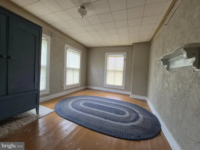 a view of livingroom with furniture and window