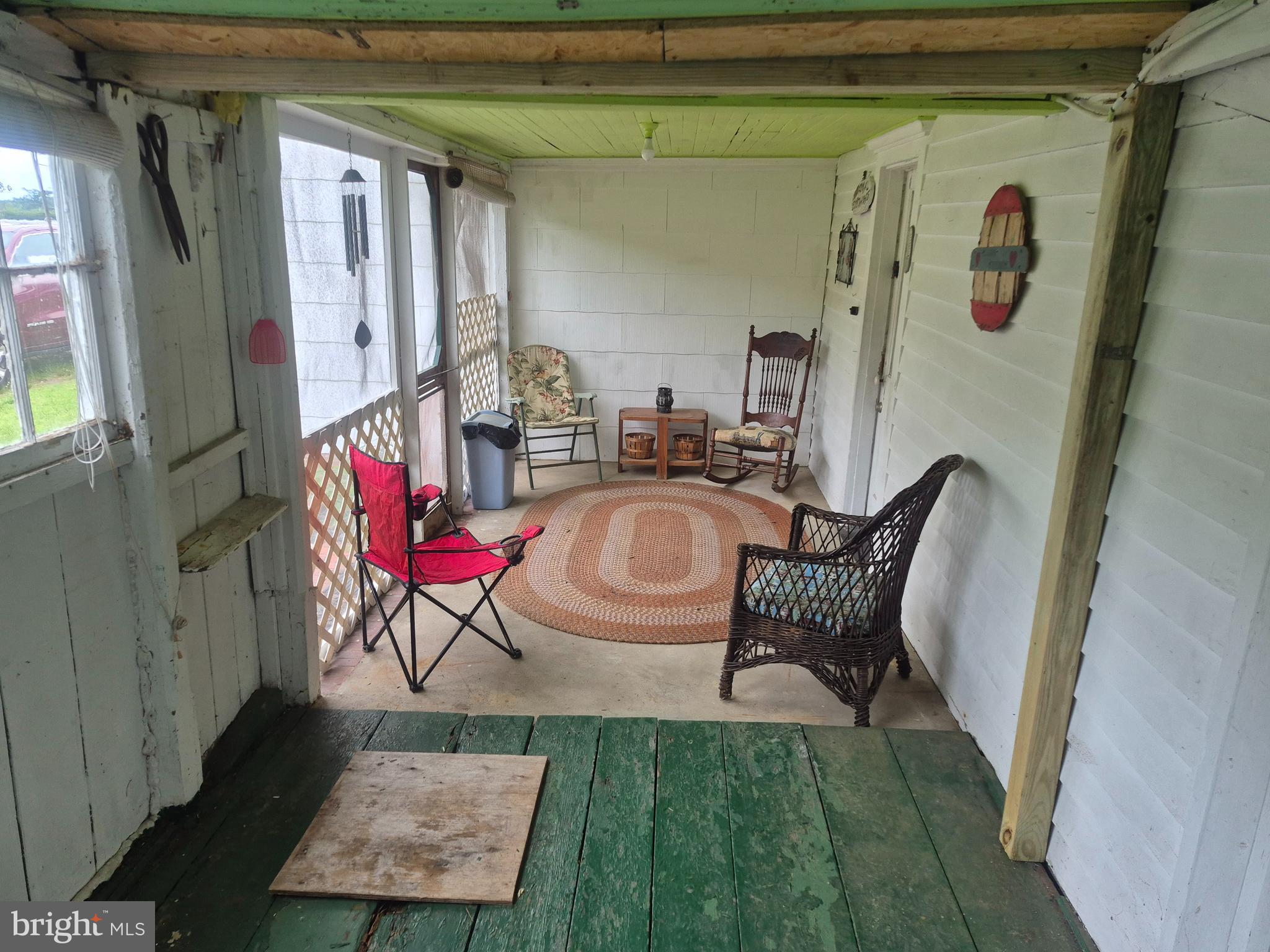 715 Main Street Sharptown, MD 21861 - Photo 25 of 36 a view of a dining room with furniture window and outside view