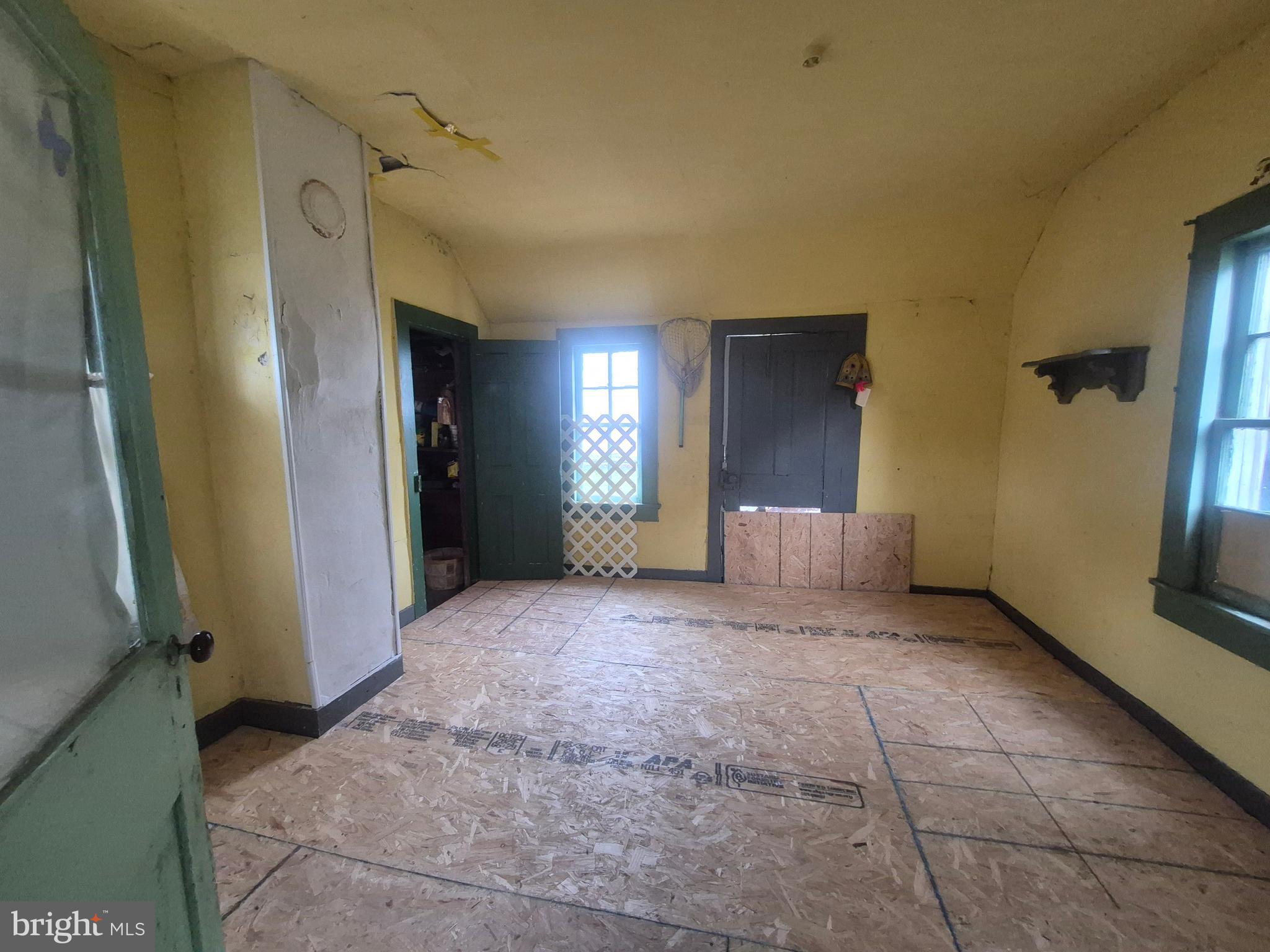 715 Main Street Sharptown, MD 21861 - Photo 26 of 36 a view of a hallway with closet and window