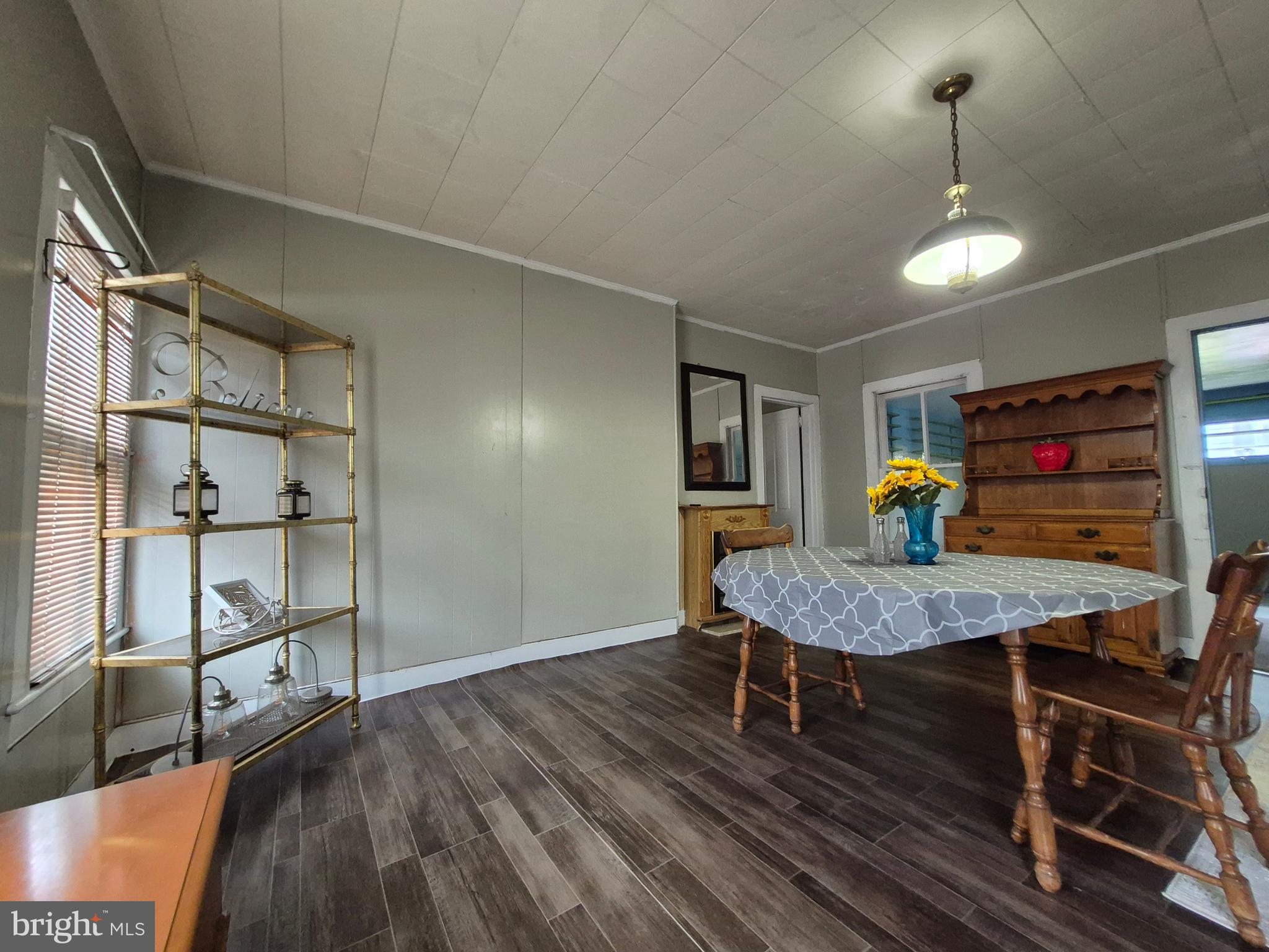 715 Main Street Sharptown, MD 21861 - Photo 8 of 36 a dining room with furniture and window
