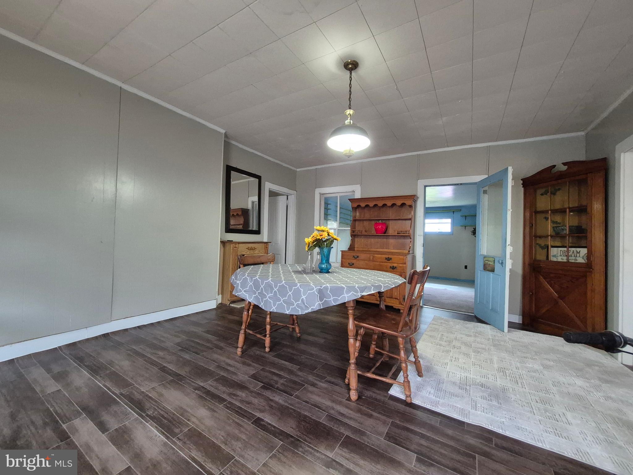 715 Main Street Sharptown, MD 21861 - Photo 9 of 36 a view of a dining room with furniture