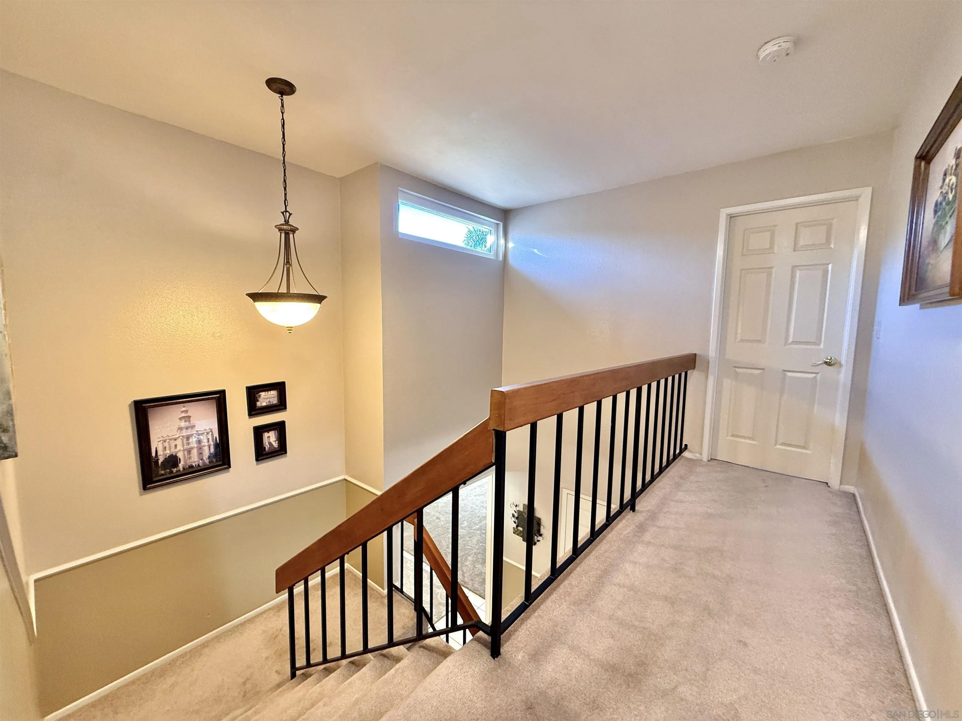 2049 Wind River Road El Cajon, CA 92019 - Photo 15 of 29 a view of a hallway with a elevator