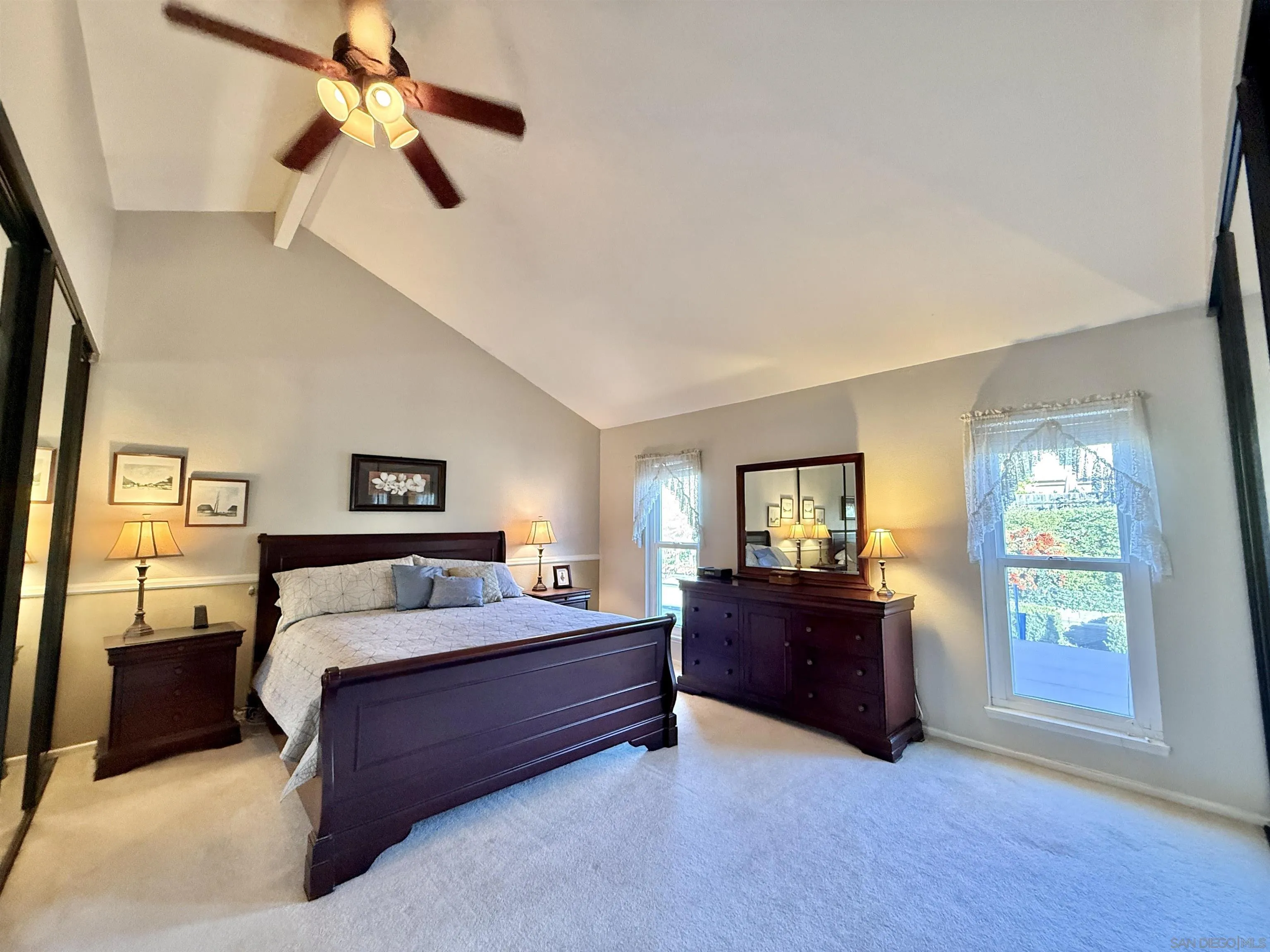 2049 Wind River Road El Cajon, CA 92019 - Photo 16 of 29 a bedroom with a bed and window