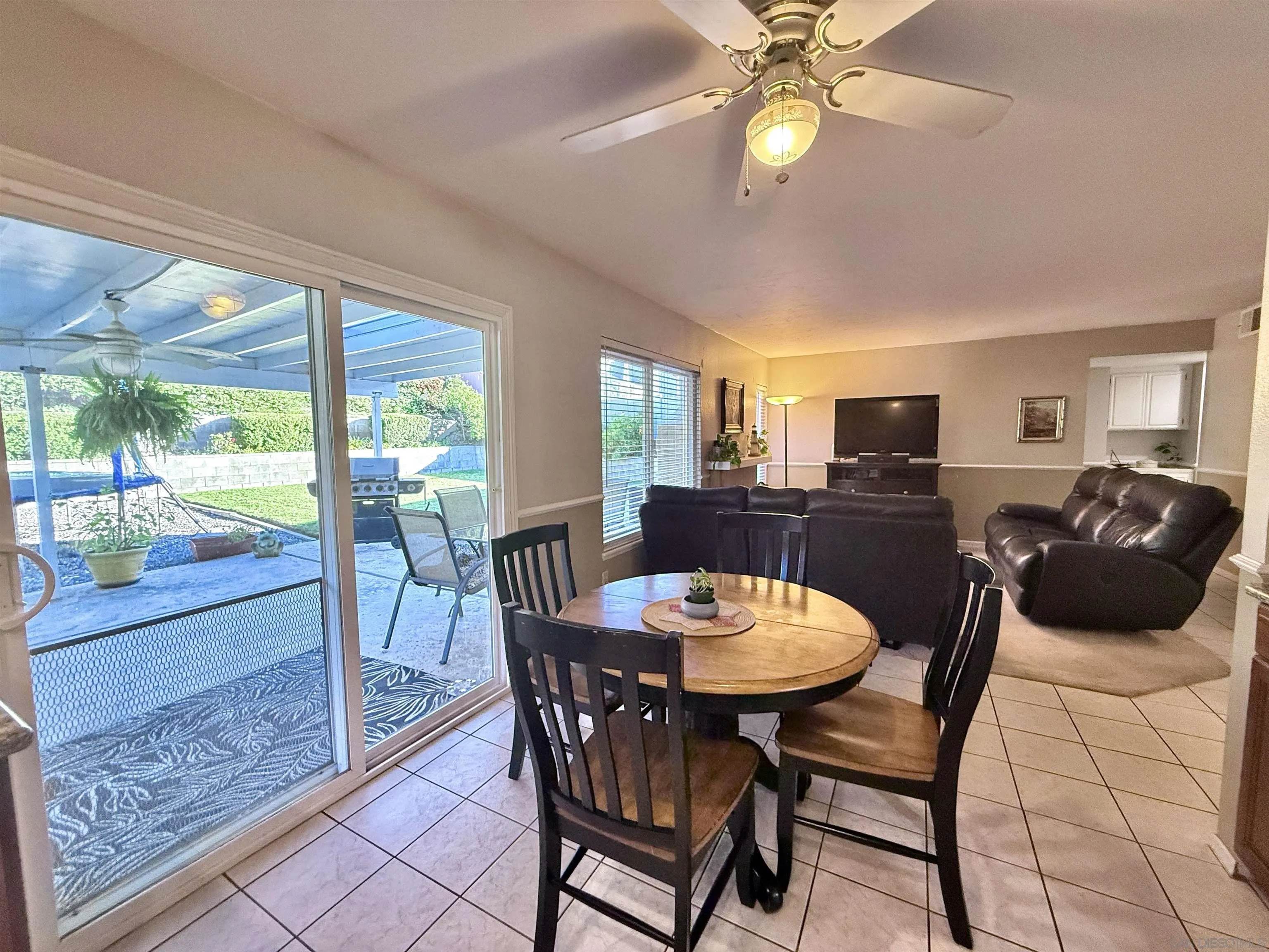 2049 Wind River Road El Cajon, CA 92019 - Photo 9 of 29 a view of a dining room with furniture window and outside view