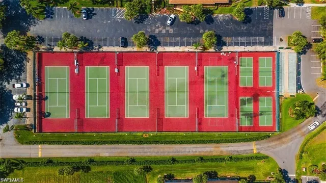 a building view with swimming pool and outdoor space