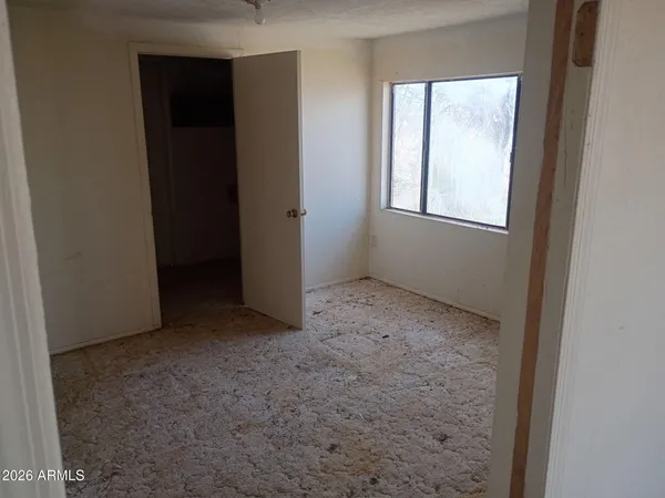 an empty room with windows