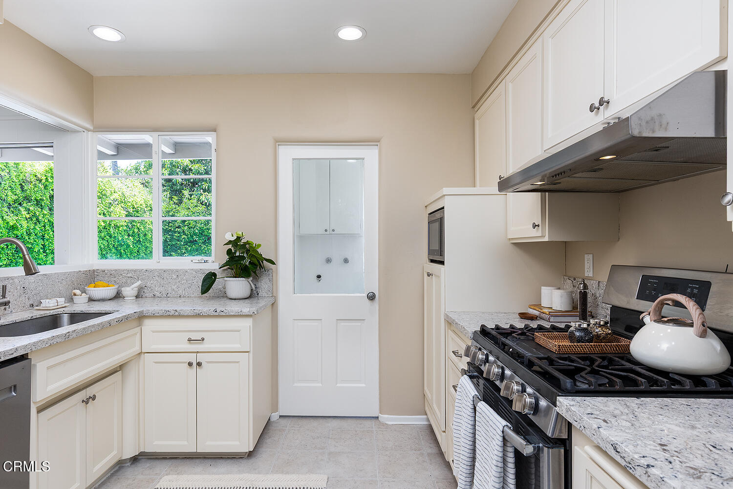 2115 Roanoke Road San Marino, CA 91108 - Photo 5 of 8 a kitchen with a stove and cabinets