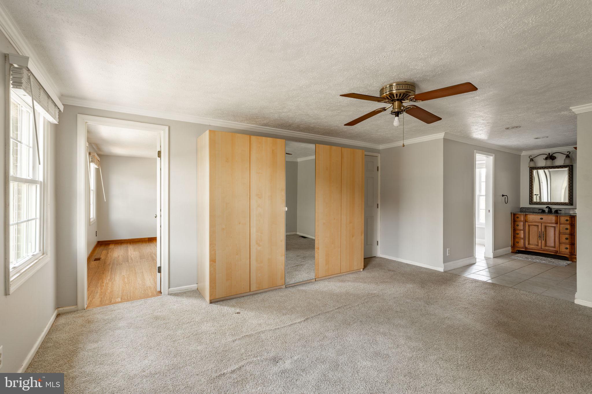 2072 Spring Valley Road Lansdale, PA 19446 - Photo 18 of 48 an empty room with fan and windows