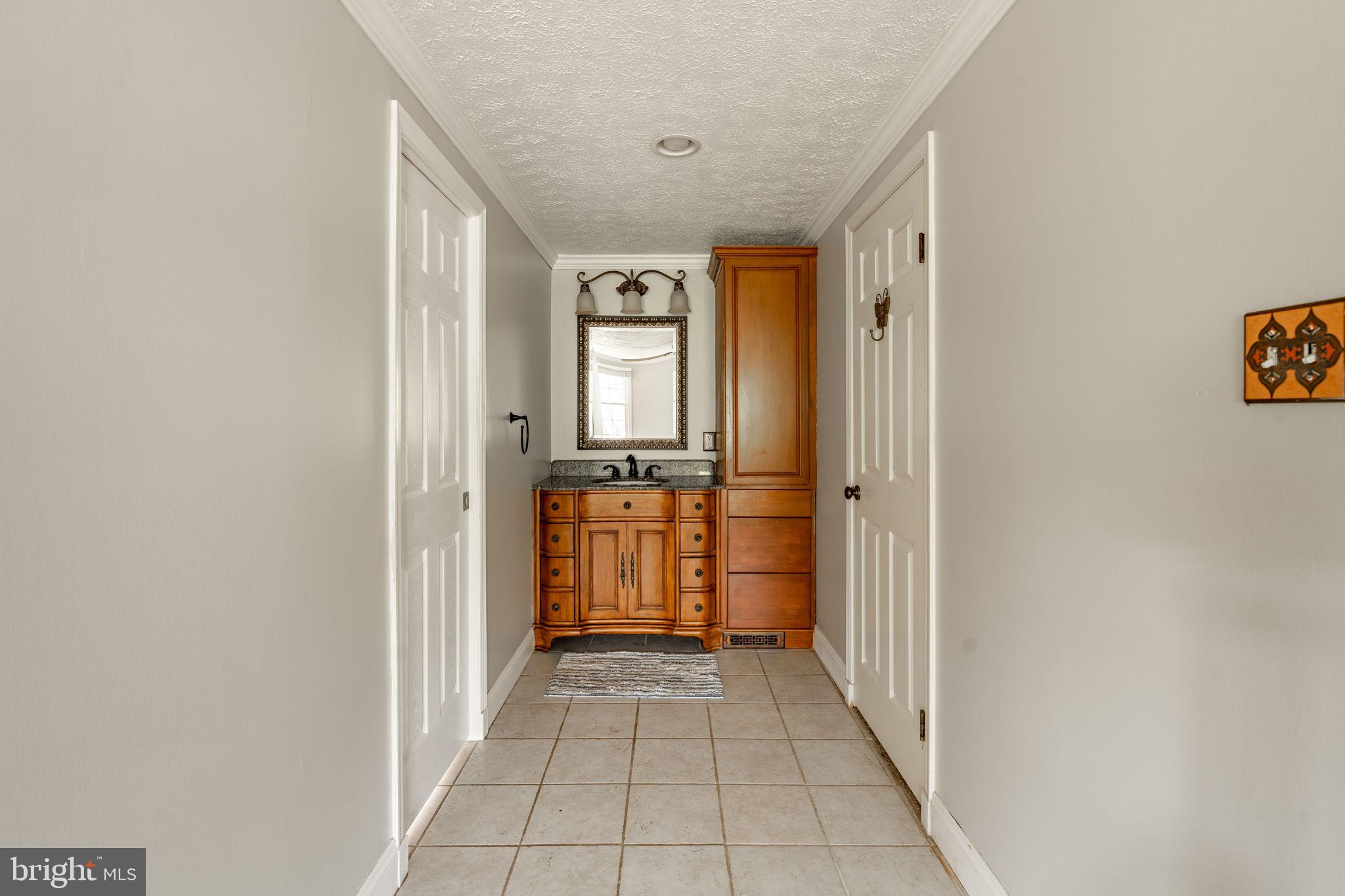 2072 Spring Valley Road Lansdale, PA 19446 - Photo 19 of 48 a view of a hallway with a dining room