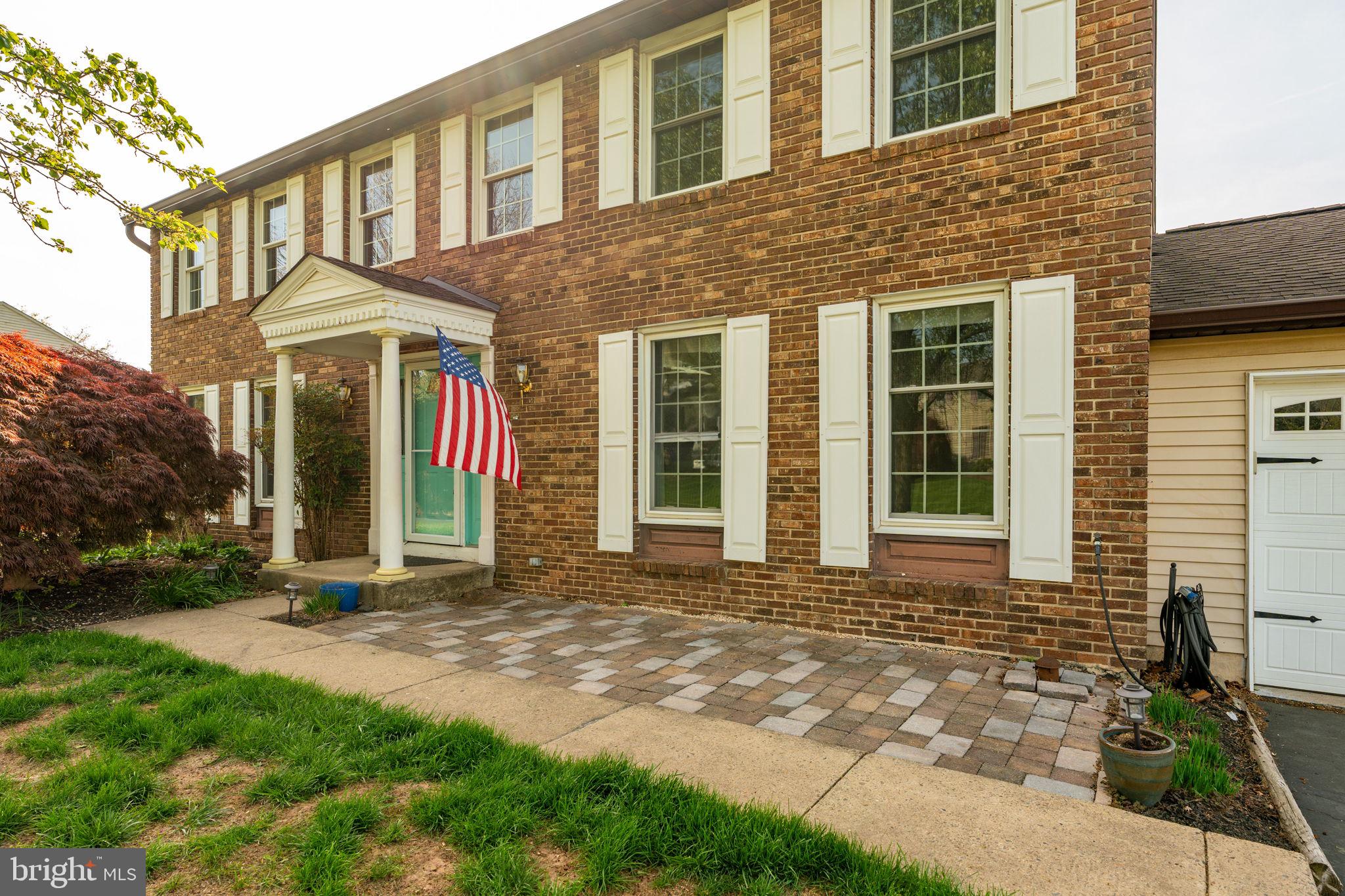 2072 Spring Valley Road Lansdale, PA 19446 - Photo 2 of 48 a front view of a house with a yard