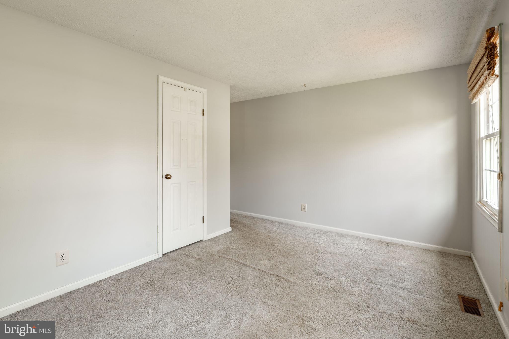 2072 Spring Valley Road Lansdale, PA 19446 - Photo 29 of 48 an empty room with windows and closet