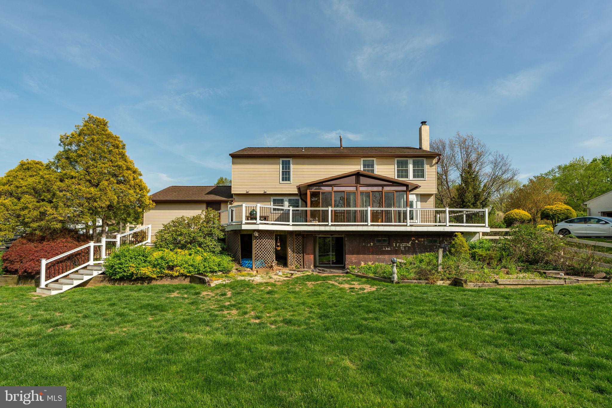 2072 Spring Valley Road Lansdale, PA 19446 - Photo 43 of 48 a front view of a house with a yard