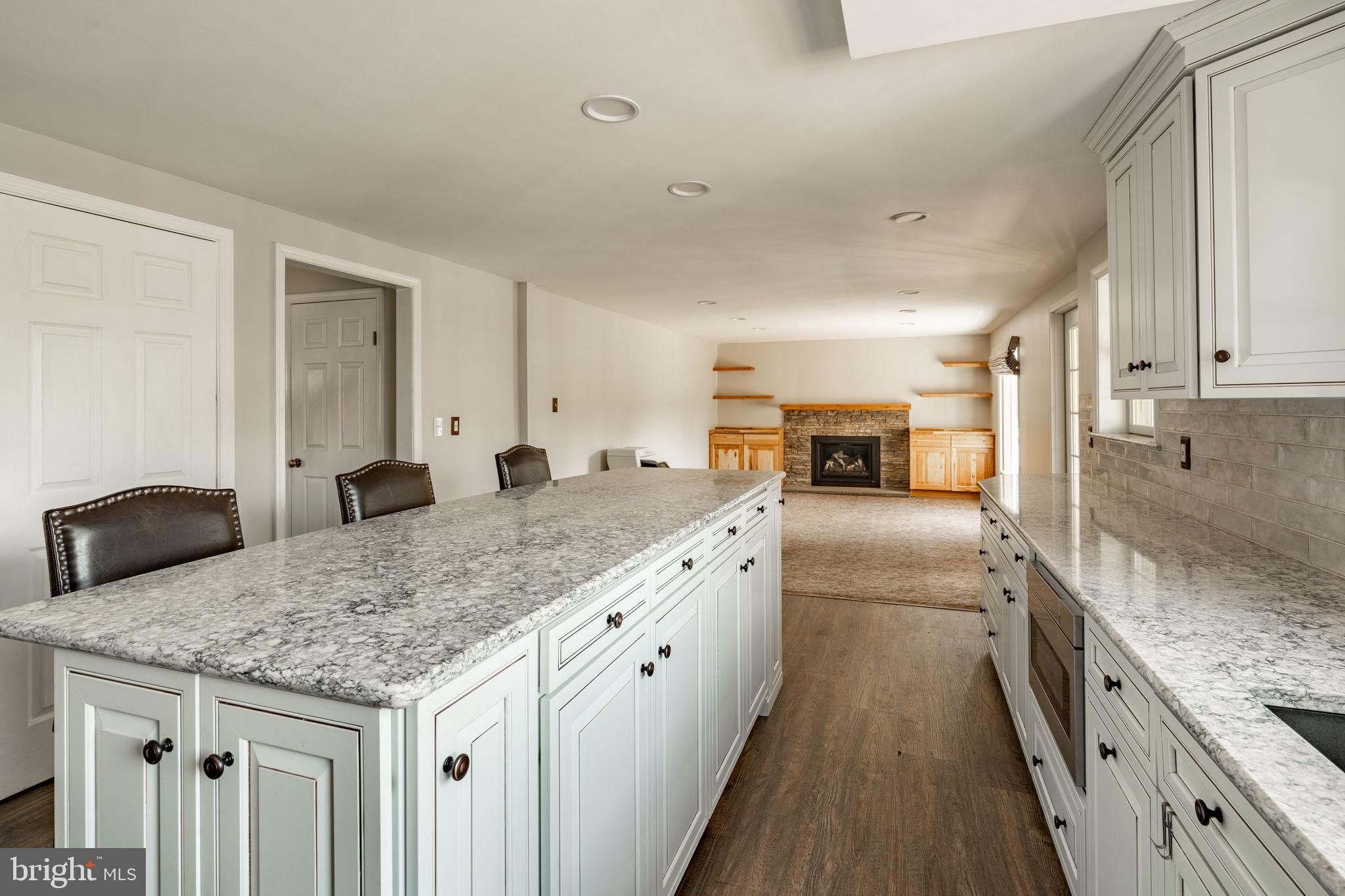 2072 Spring Valley Road Lansdale, PA 19446 - Photo 5 of 48 a kitchen with granite countertop a sink and stove