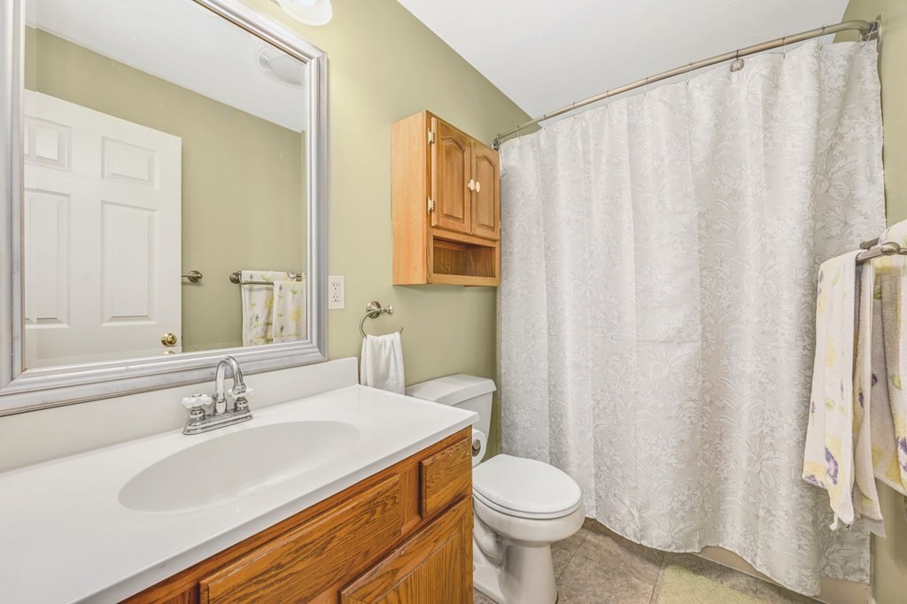 45 Boston Road, Unit C Sutton, MA 01590 - Photo 23 of 35 a bathroom with a sink and a toilet