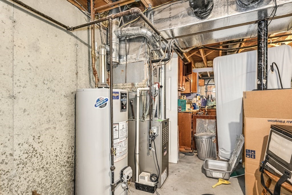 45 Boston Road, Unit C Sutton, MA 01590 - Photo 25 of 35 a view of a storage & utility room with refrigerator