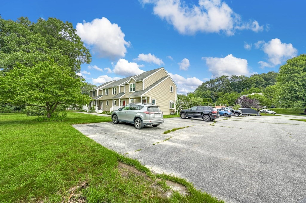 45 Boston Road, Unit C Sutton, MA 01590 - Photo 3 of 35 a view of a street with a parked cars