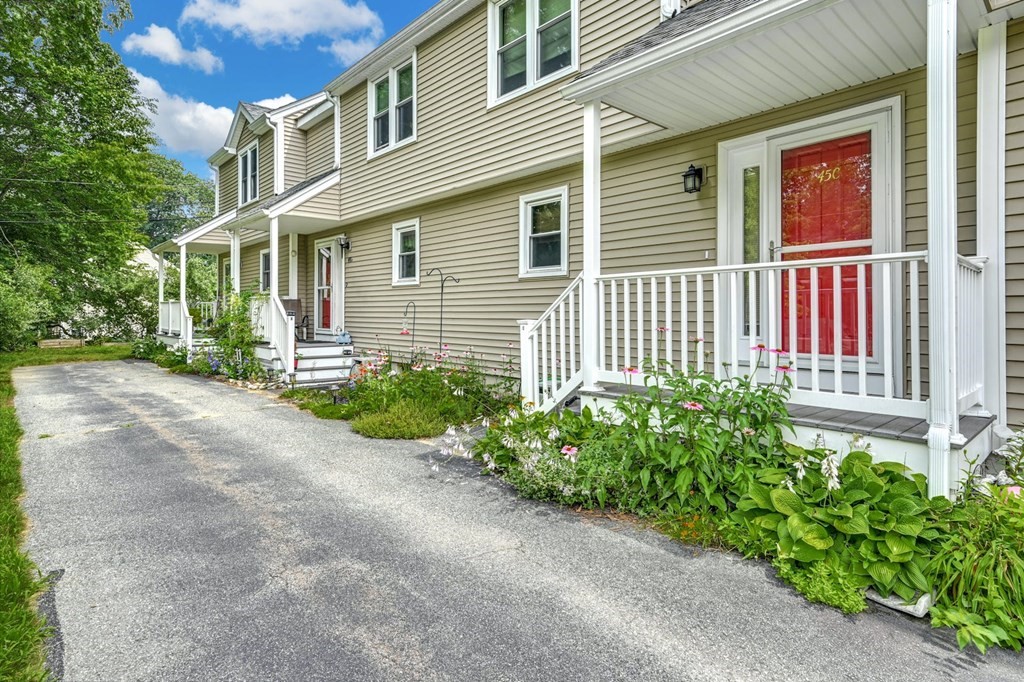 45 Boston Road, Unit C Sutton, MA 01590 - Photo 5 of 35 a front view of a house with garden