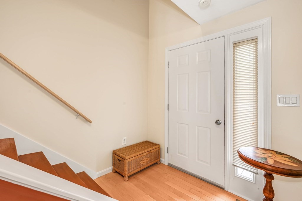 45 Boston Road, Unit C Sutton, MA 01590 - Photo 7 of 35 a view of room with wooden floor and chair