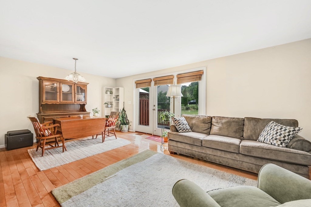 45 Boston Road, Unit C Sutton, MA 01590 - Photo 8 of 35 a living room with furniture and a window
