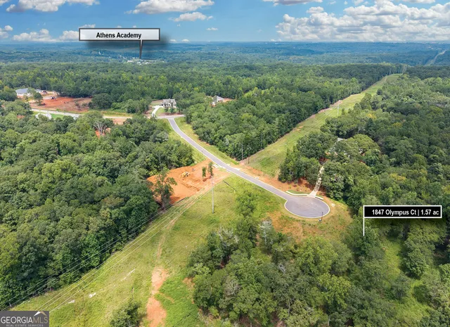 a view of a lake with a yard