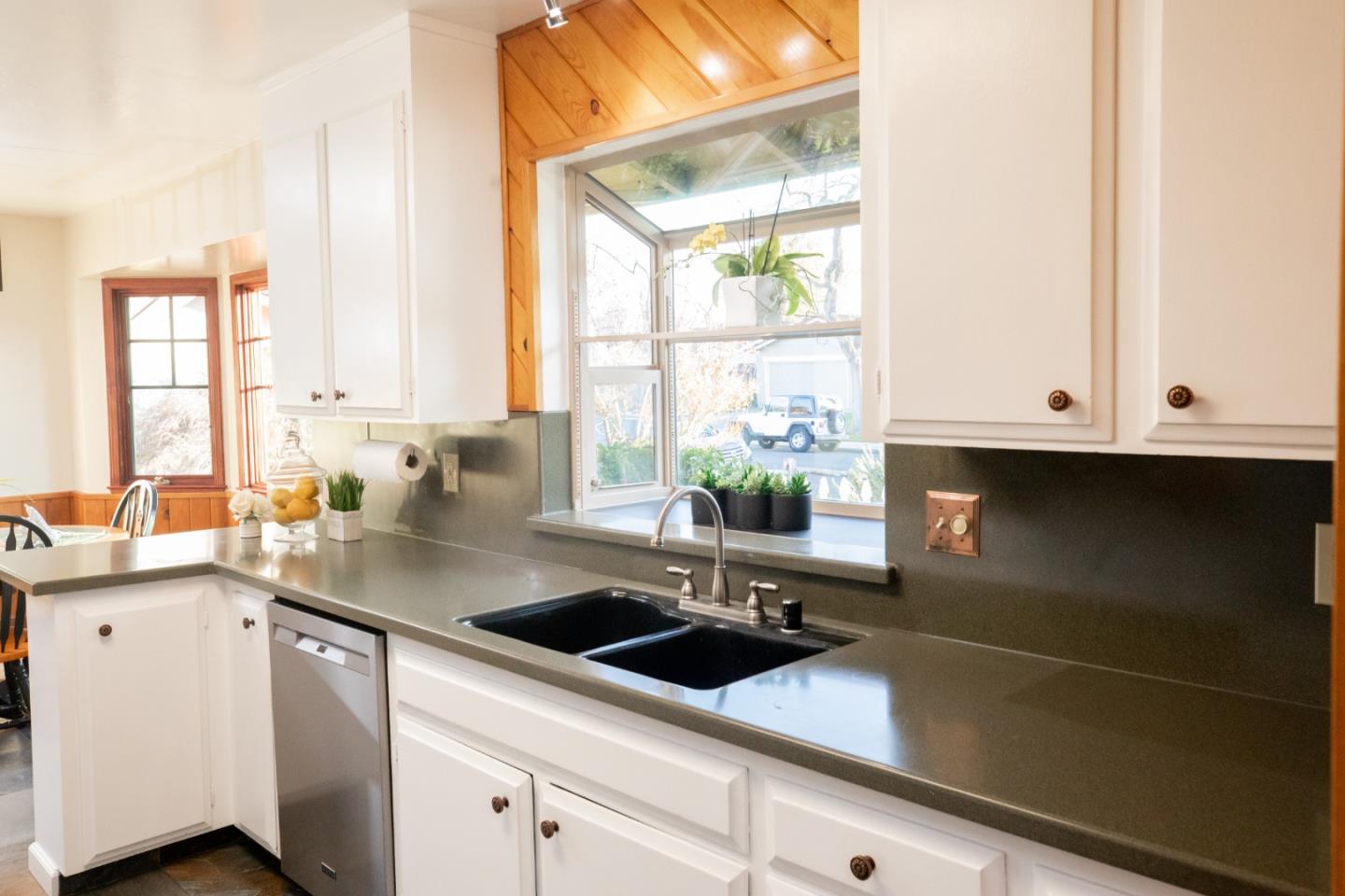 1163 Crespi Drive Sunnyvale, CA 94086 - Photo 13 of 49 a kitchen with a sink and cabinets