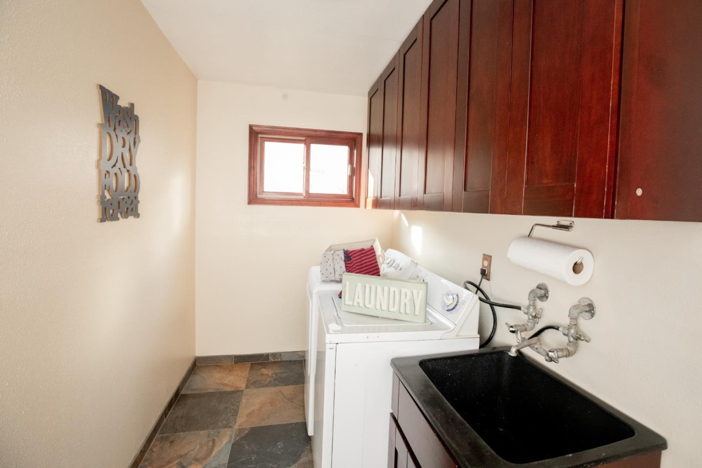 1163 Crespi Drive Sunnyvale, CA 94086 - Photo 24 of 49 a kitchen with a sink and cabinets