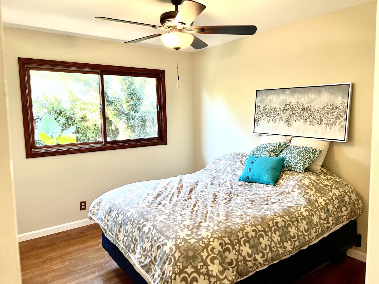 1163 Crespi Drive Sunnyvale, CA 94086 - Photo 30 of 49 a bedroom with a large bed and a window