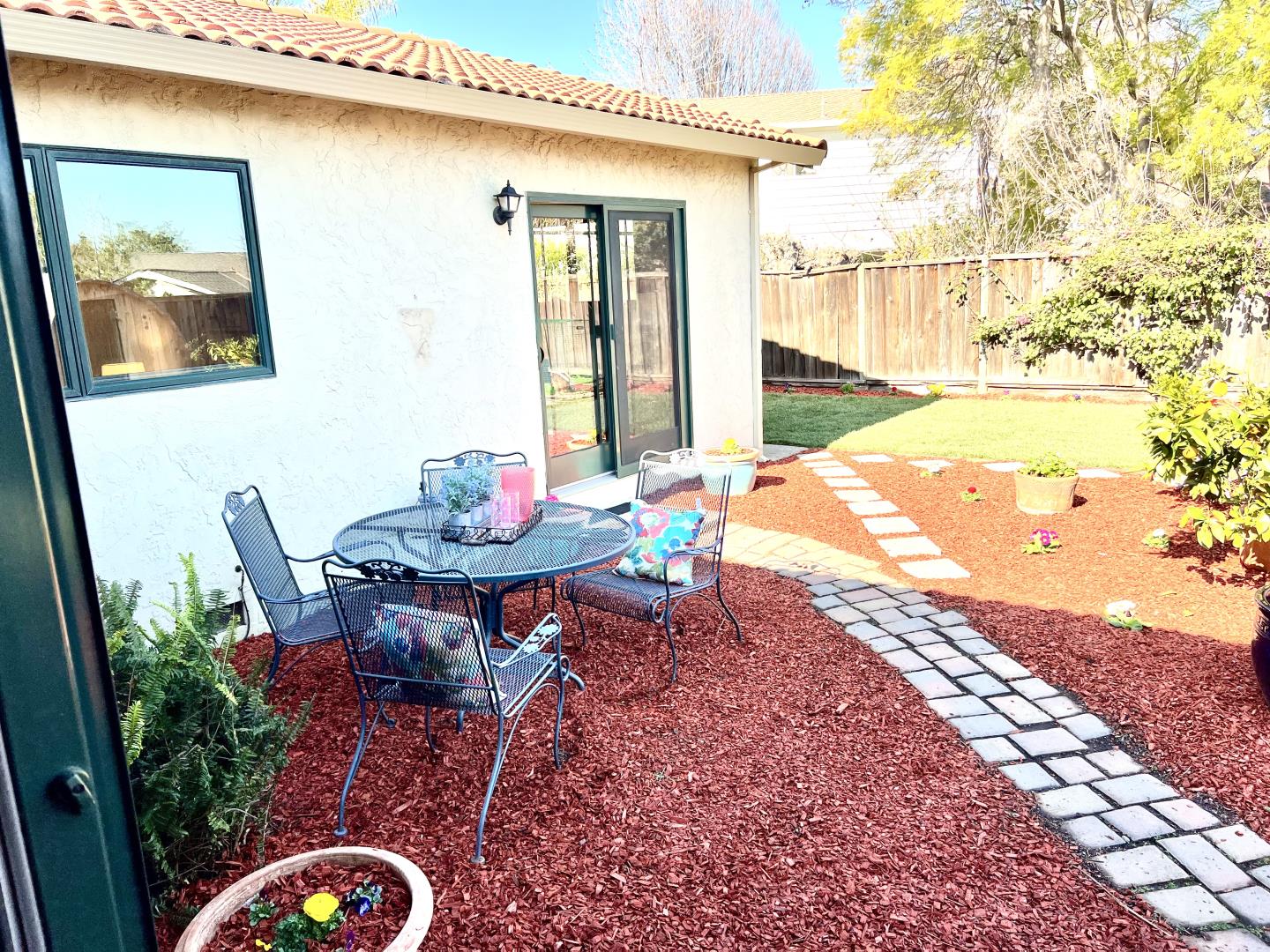 1163 Crespi Drive Sunnyvale, CA 94086 - Photo 43 of 49 a backyard of a house with table and chairs