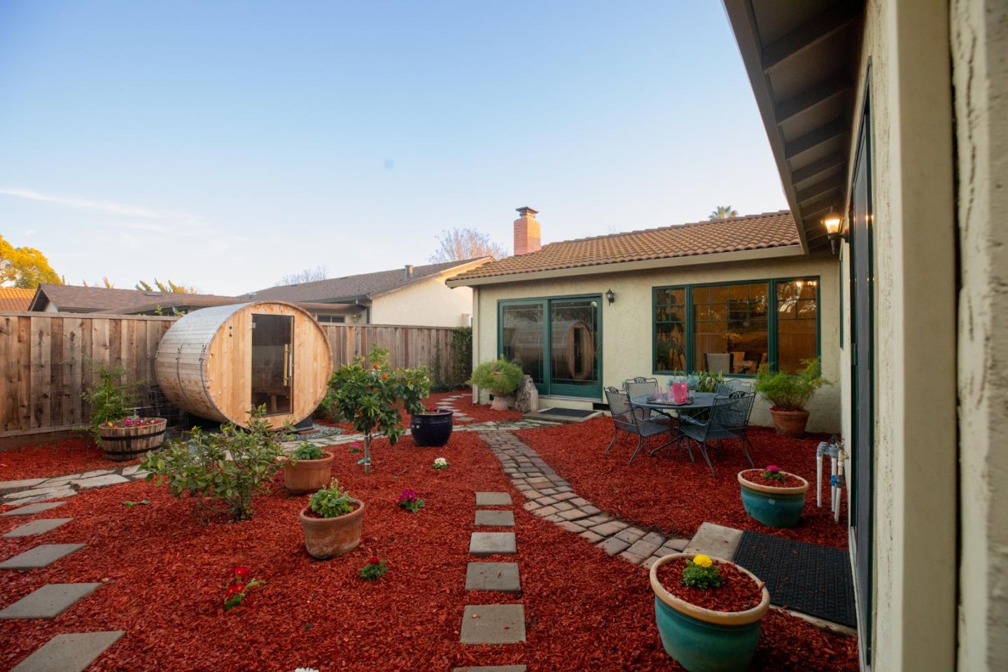 1163 Crespi Drive Sunnyvale, CA 94086 - Photo 47 of 49 a view of a backyard with garden and patio