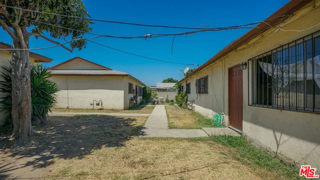 a view of a house with a patio