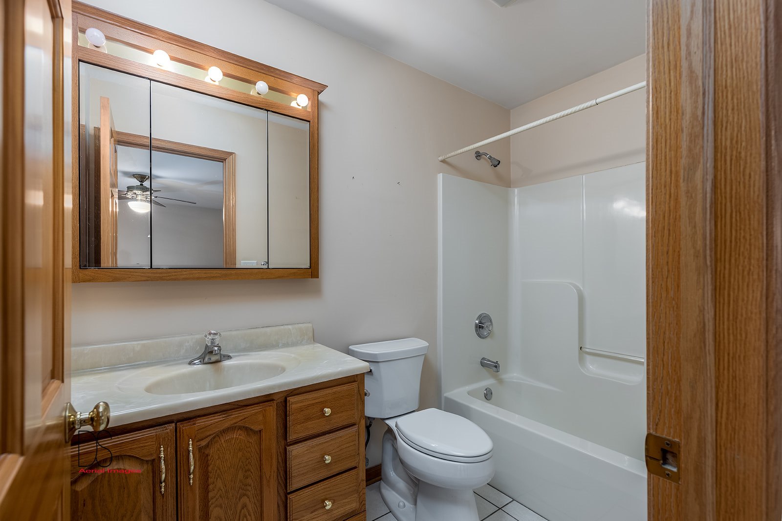 3976 East 2259th Road Serena, IL 60549 - Photo 10 of 24 a bathroom with a granite countertop sink toilet and shower