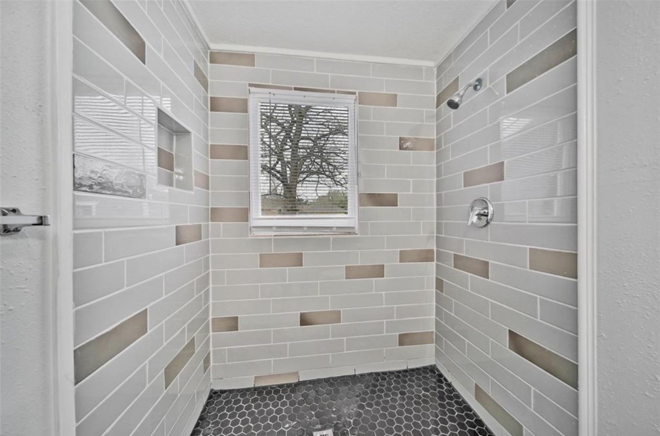 2205 Sumpter Street Houston, TX 77026 - Photo 5 of 7 a bathroom with a shower