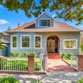 a front view of a house with a porch