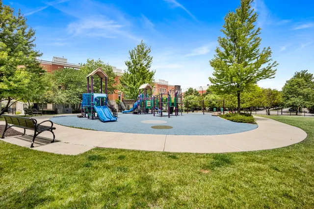 a swimming pool with outdoor seating and yard