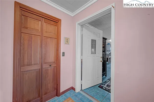 a bathroom with a shower and a sink