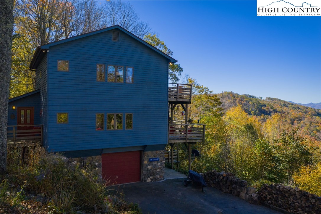 540 Mountain Farm Road Boone, NC 28607 - Photo 2 of 46 a view of a house with a yard