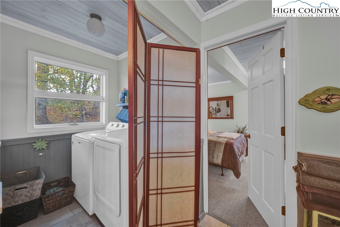 540 Mountain Farm Road Boone, NC 28607 - Photo 25 of 46 a room with a bed and a window