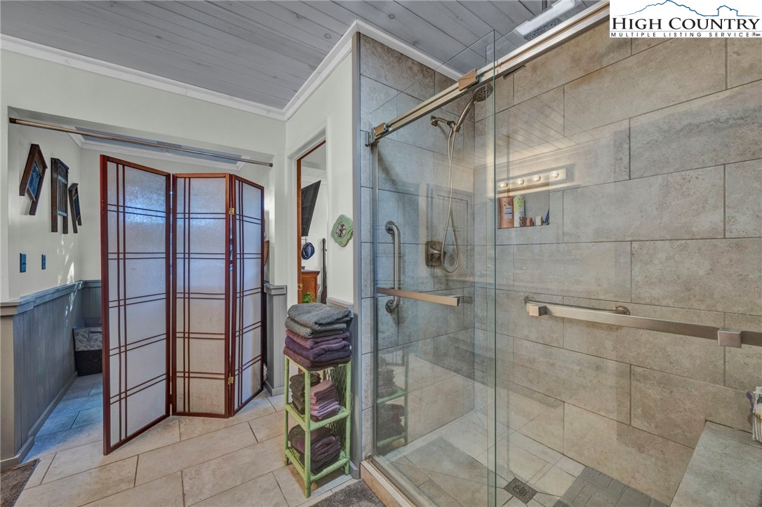 540 Mountain Farm Road Boone, NC 28607 - Photo 27 of 46 a bathroom with a shower and a sink
