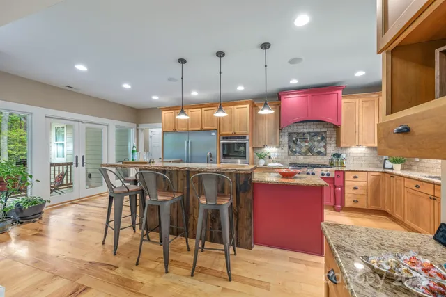 a kitchen with kitchen island granite countertop lots of counter top space