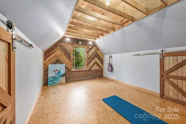 a room with lots of furniture and clutter