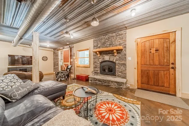 a livingroom with furniture and a window