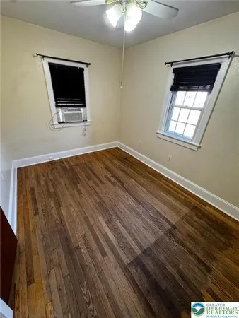 a view of a livingroom with a flat screen tv