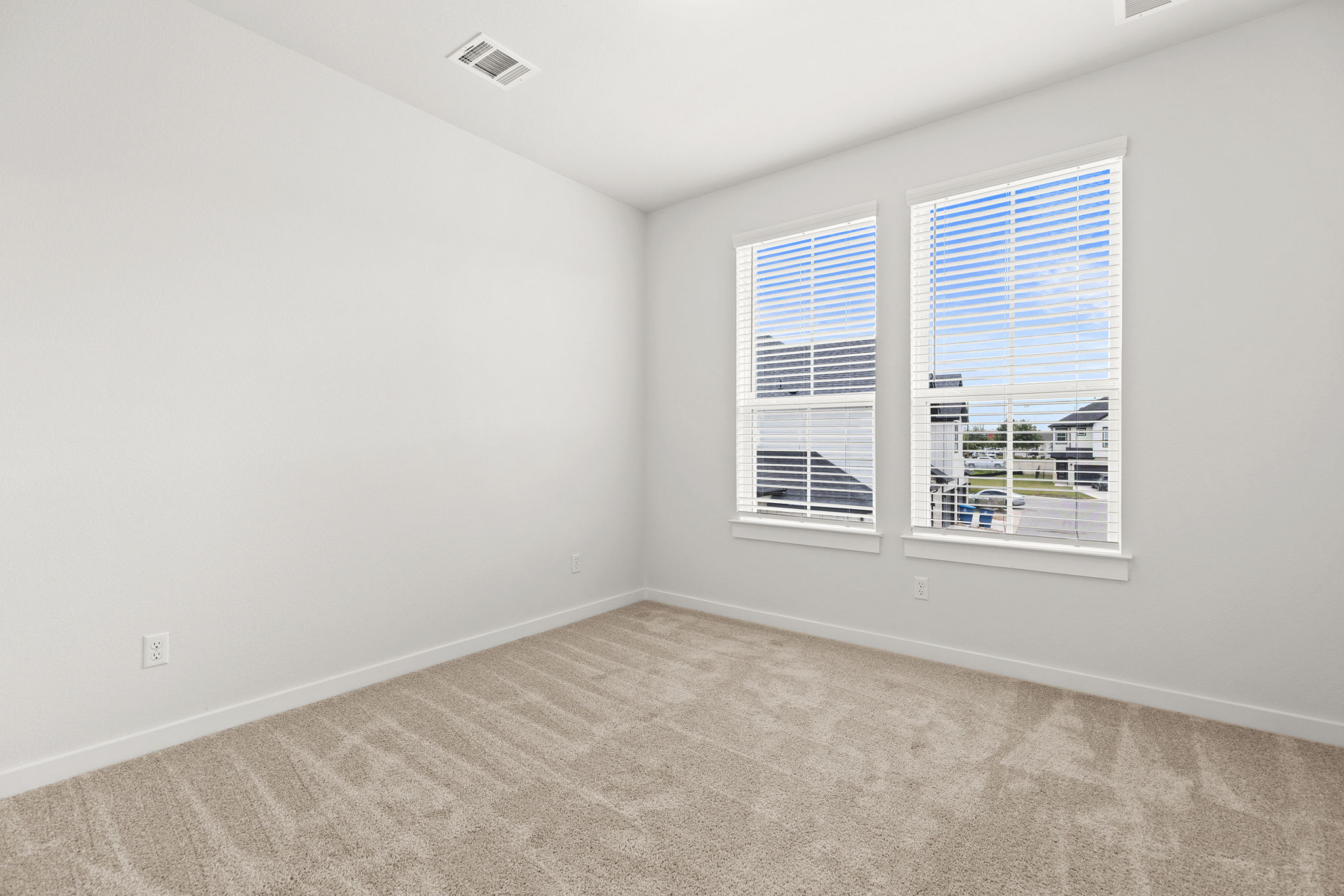 2600 Gattis School Road, Unit 1001 Round Rock, TX 78664 - Photo 28 of 40 An airy bedroom with fresh carpet and ample natural light awaits your personal touch.
