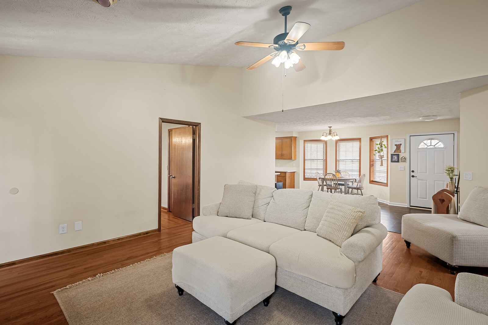 2427 Toler Road Woodlawn, TN 37191 - Photo 13 of 48 a living room with furniture and a chandelier