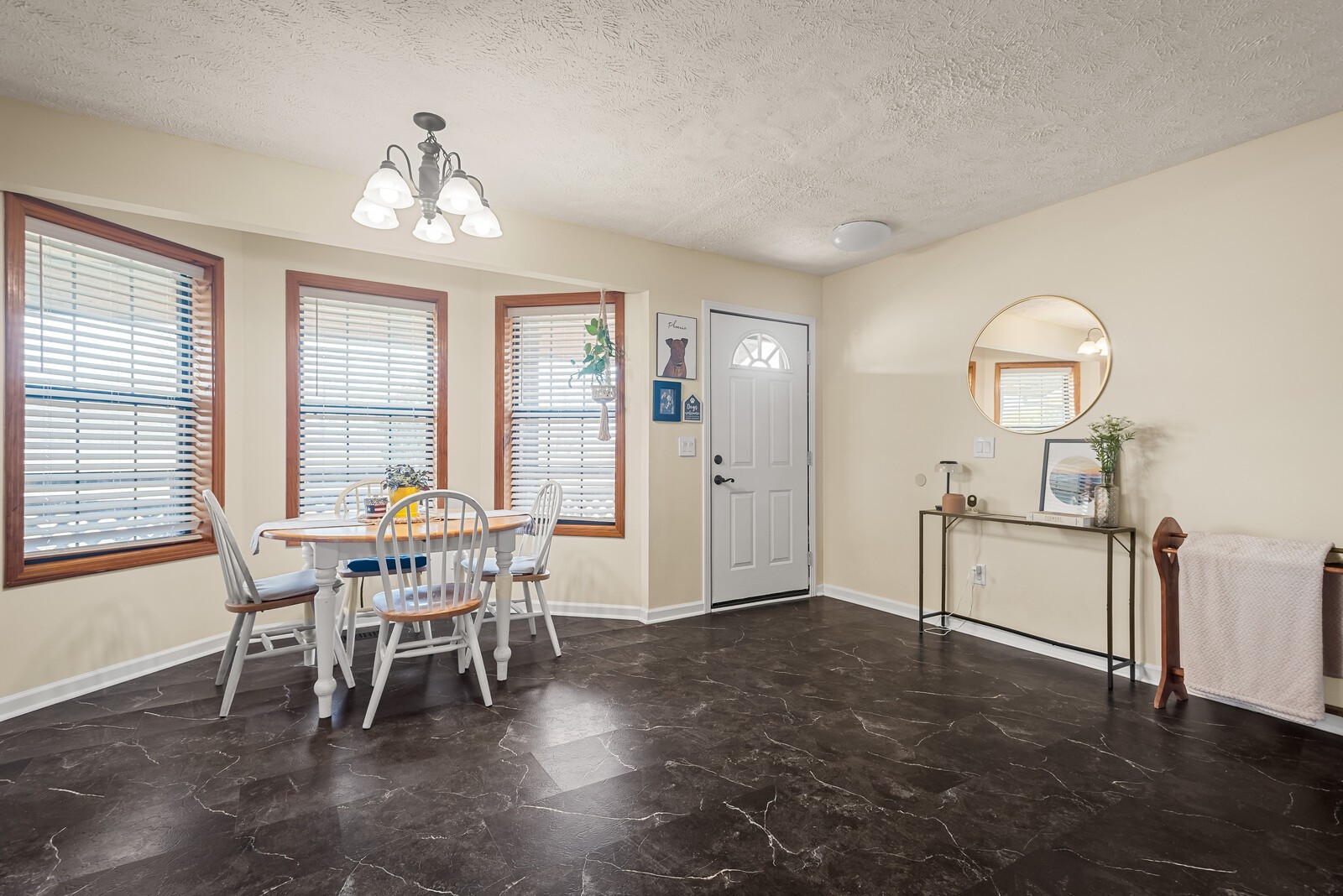 2427 Toler Road Woodlawn, TN 37191 - Photo 15 of 48 a view of a dining room with furniture and chandelier